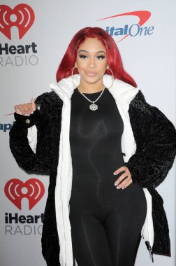 Saweetie at the 102.7 KIIS FM's Jingle Ball 2021 held at the Forum in Inglewood, USA on December 3, 2021.