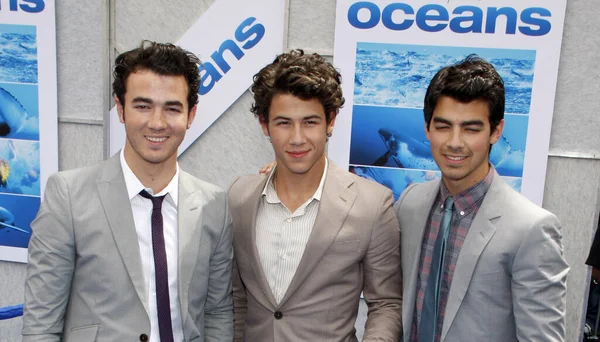 Нік Джонас Кевін Джонас Джо Джонас Jonas Brothers Прем Єрі — стокове фото