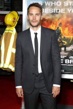 Taylor Kitsch, 8 Ekim 2017 'de ABD' nin Westwood kentindeki Regency Village Theatre 'da düzenlenen 