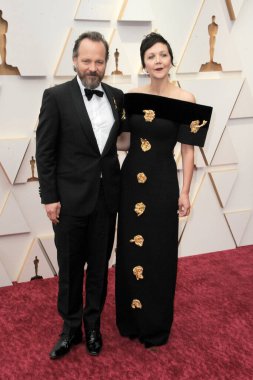 Maggie Gyllenhaal ve Peter Sarsgaard, 27 Mart 2022 'de ABD' nin Los Angeles kentindeki Dolby Tiyatrosu 'nda düzenlenen 94..