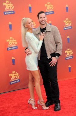 Heather Rae El Moussa ve Tarek El Moussa, 6 Haziran 2022 'de ABD' nin Santa Monica kentindeki Barker Hangar 'da düzenlenen 2022 MTV Film ve TV Ödülleri' nde.