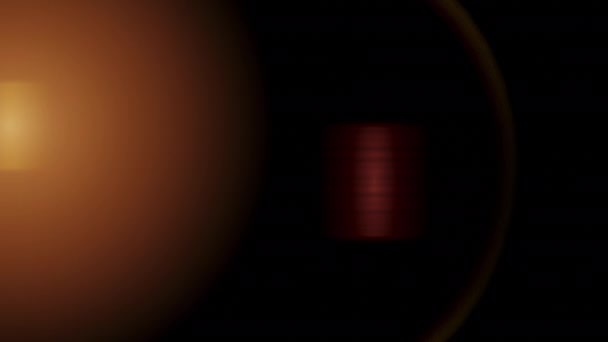 橙色光和镜头耀斑左右移动的视频材料 镜头耀斑 光泄漏 — 图库视频影像
