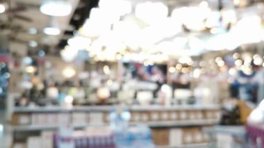 Görüntü, bulanık elektronik mağazası ve dükkan ışıklarından bokeh. Tayland 'da bir mağazanın içinde..