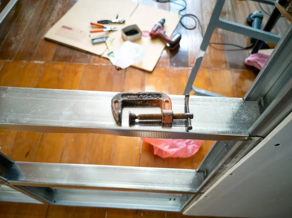 High Angle View Clamp Placed Galvanized Frame Blurred Back Wooden — Fotografia de Stock