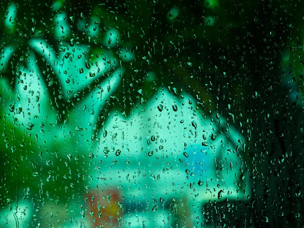 Raindrops Window Glass Blurry Shadows Black Green Leaves City Buildings — Stock Photo, Image