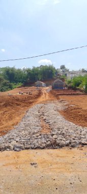 Endonezya 'nın Cikancung bölgesinde yeni inşa edilmiş bir yolun soyut arkaplan fotoğrafı değil.
