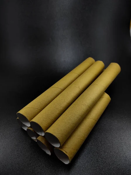 Photo Stack Brown Cardboard Rolls Isolated Black Background Focus — Stock Photo, Image