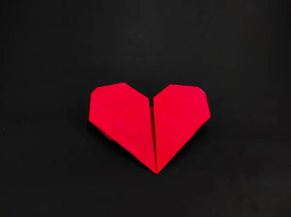 Astratto Sfocato Arancione Origami Forma Cuore Isolato Sfondo Nero — Foto Stock