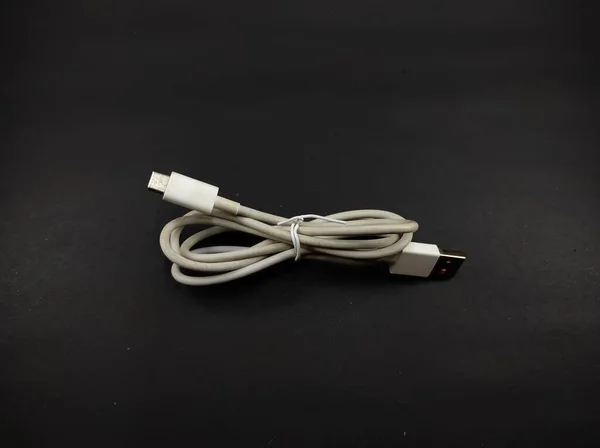 Photo White Cable Isolated Black Background Focus — Stock Photo, Image