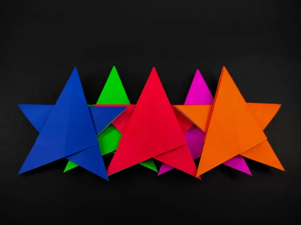 Abstract Defocused Five Colored Star Made Origami Paper Isolated Black — Stock Photo, Image