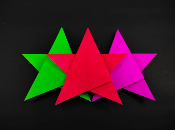 Abstract Defocused Three Colored Star Made Origami Paper Isolated Black — Stock Photo, Image