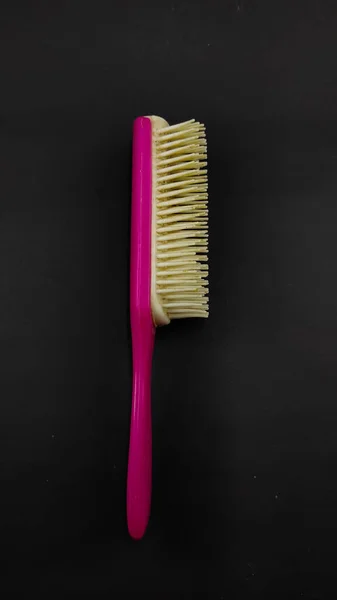 White Pink Straight Comb Isolated Black Background Focus — Stock Photo, Image