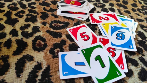 Uno Cards Scattered Brown Carpet Focus — Stockfoto