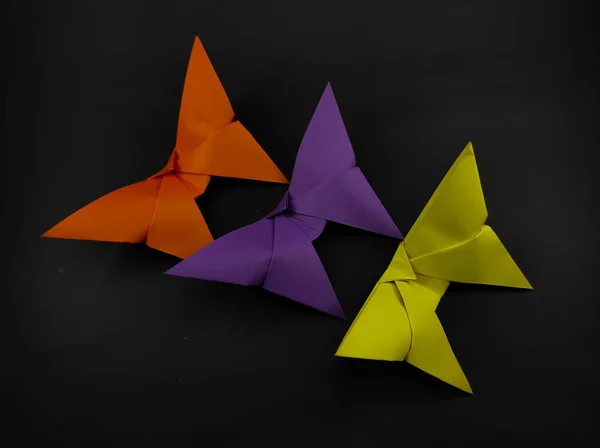 Three Colored Origami Butterfly Isolated Black Background Focus — Stock Photo, Image