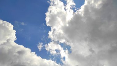 Abstract defocused view of clouds with clear blue sky over Cikancung area, Indonesia