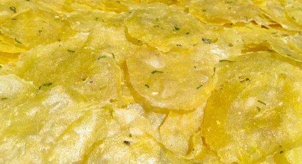 Abstract Defocused Blurred Background Photo of processed cassava chips, dried in the sun in the Cikancung area - Indonesia. Not Focus