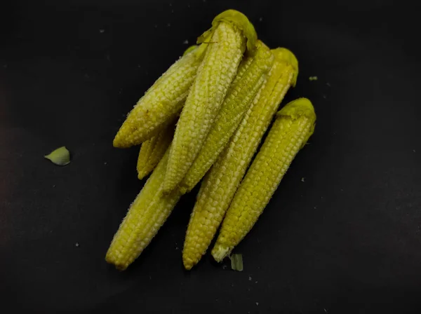 Photo Pile Pickled Baby Corn Isolated Black Background Cikancung Area — Stock fotografie