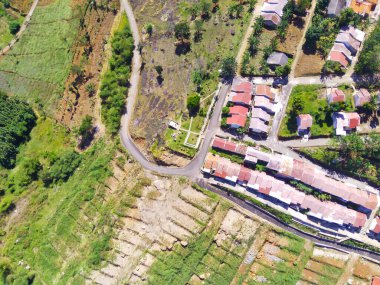 Abstract Defocused Blurred Background Aerial photography a view of a residential area located on a hilltop and surrounded by forests and cliffs in the Cikancung area - Indonesia. Not Focus