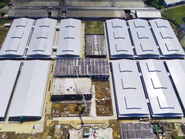 Endonezya 'nın doğusundaki Bandung bölgesi için özel olarak inşa edilen tekstil fabrikalarının bulanık arka plan koleksiyonu. Odaklanma