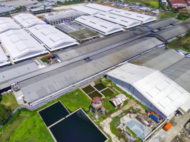 Endonezya 'nın doğusundaki Bandung bölgesi için özel olarak inşa edilen tekstil fabrikalarının bulanık arka plan koleksiyonu. Odaklanma