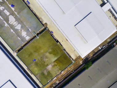 Endonezya 'nın doğusundaki Bandung bölgesi için özel olarak inşa edilen tekstil fabrikalarının bulanık arka plan koleksiyonu. Odaklanma