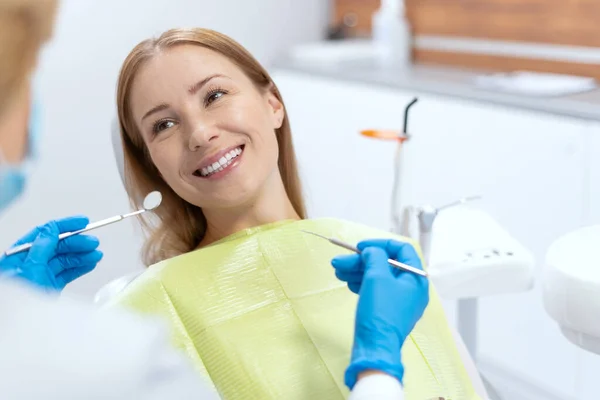 Side View Smiling Woman Dentist Appointment Treating Teeth Dental Instruments — 图库照片