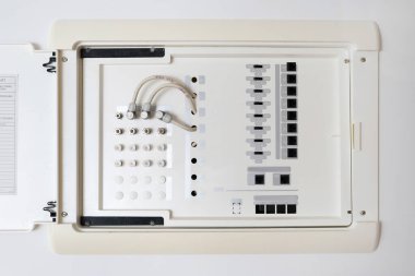 Close up view of opened electric shield with different wires and ports. Outlet panel with internet, tv and energy distribution in apartment and residential building