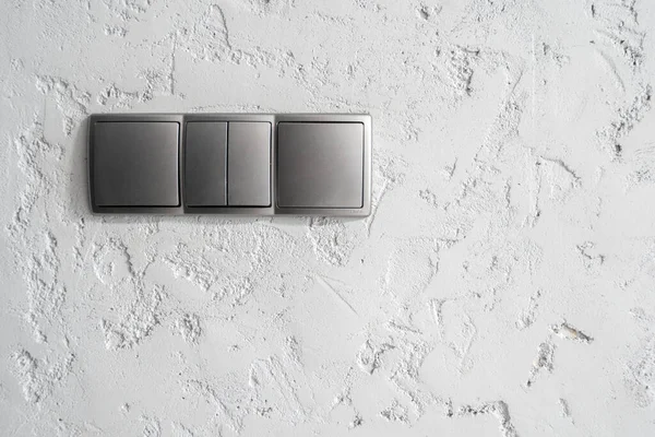 Cropped View Grey Light Switches Textured Wall Modern Apartment Renovation — Stockfoto