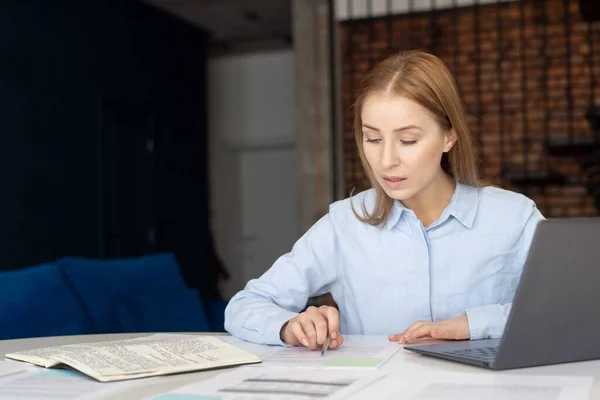 Portrait Confident Woman Carefully Examining Financial Report Her Home Office — Stok fotoğraf