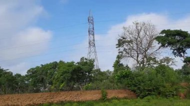 Time lapse video of High Voltage electricity Tower.  View of  fields with high-voltage transmission lines and electricity Towers. high voltage post.