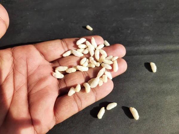 Puffed rice orpopped rice. Its puffed grainmade fromrice. A breakfast cerealsand other snack foods. Traditional methods to puff or pop rice frying inoil, sand and salt. Murmura, roasted grain.