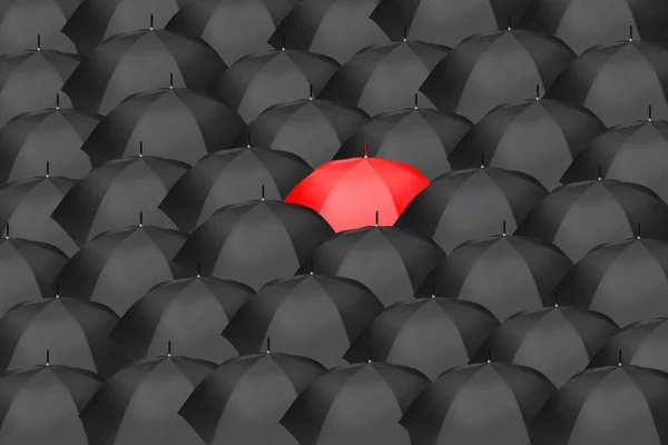Zee Van Zwarte Paraplu Met Een Rode Paraplu Het Midden — Stockfoto