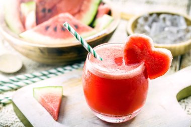 natural watermelon juice with fruit heart, red fruit cocktail served chilled