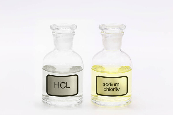 bottle of sodium chlorite next to activator Hydrochloric acid HCL, purifying chemicals and powerful disinfectants
