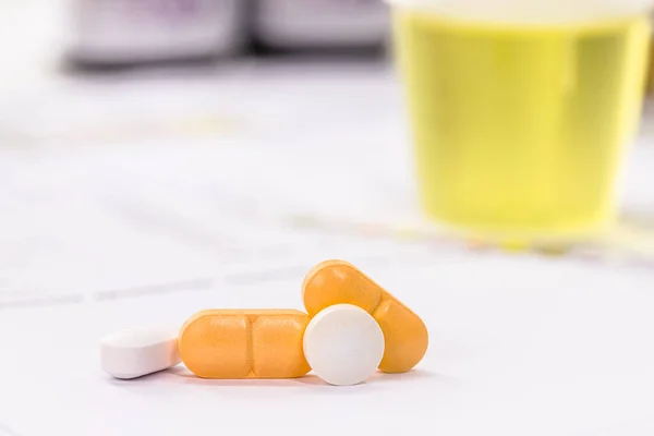 Pills Oral Urinary Incontinence Medication Urine Bottle Background Testing Lab — Foto de Stock