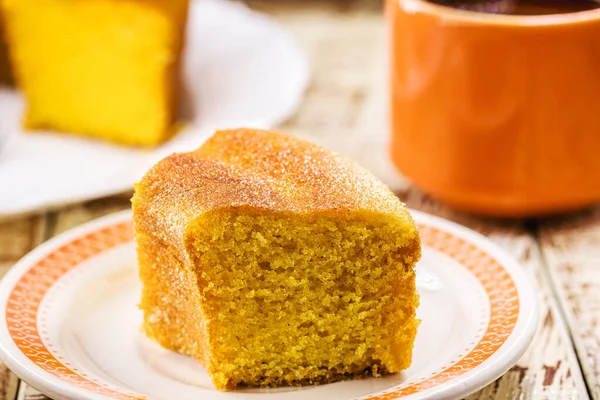 Brazilian cornmeal cake, yellow corn cake served at the June Festivals of Minas Gerais, served with coffee