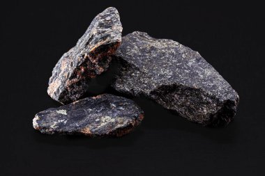 granite or crushed stone, ore used industrially in paving and construction industries