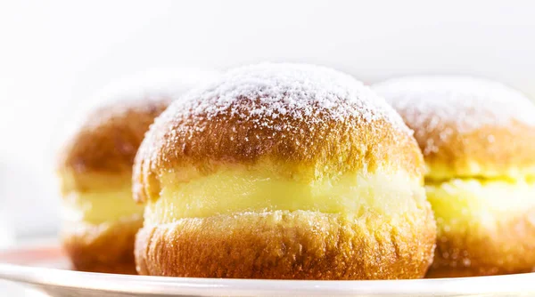 sweet bread or donut with sugar and stuffed with cream, called in Brazil as a bakery dream and in Germany as Berliner Ballen
