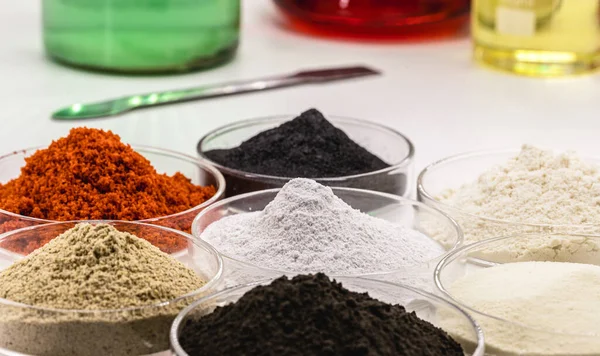 pigments for coloring, colored iron oxide, in petri dish, laboratory, precision balance, industrial use, porcelain and ink