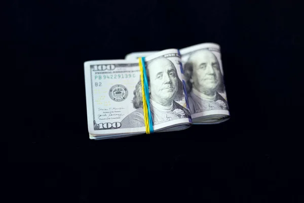 Dollars Een Zwarte Achtergrond — Stockfoto