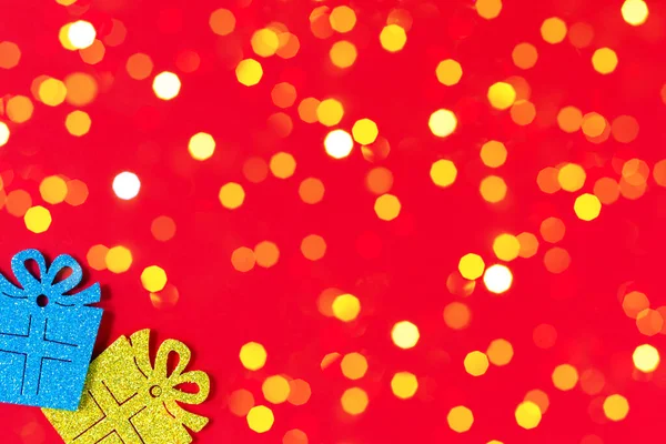 Blue Yellow Gifts Christmas Orange Background Blurred Lights — Stock fotografie