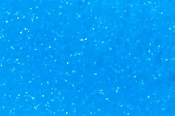 Light blue glitter background. Textured shiny background for your design
