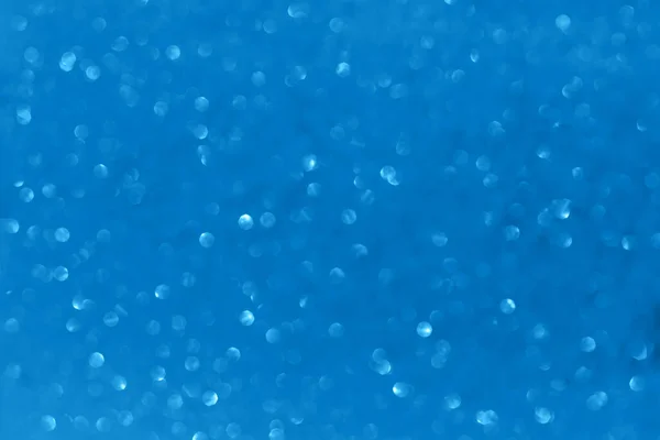 Blue glitter background. Textured shiny background for your design