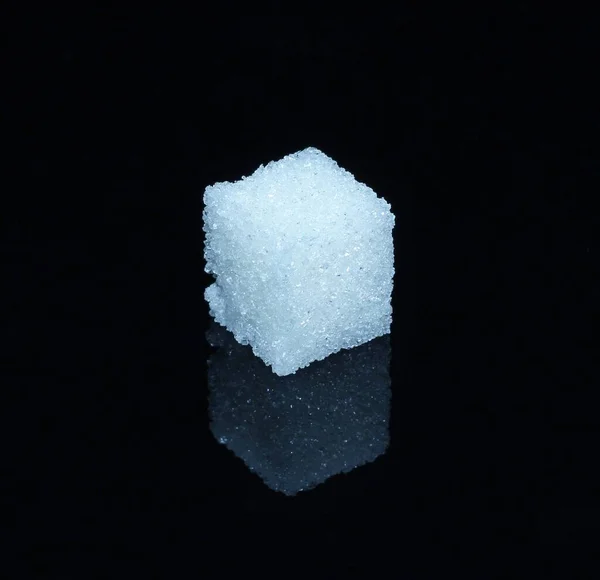 White Sugar Cube Crystals Black Glossy Glass — Stock Photo, Image