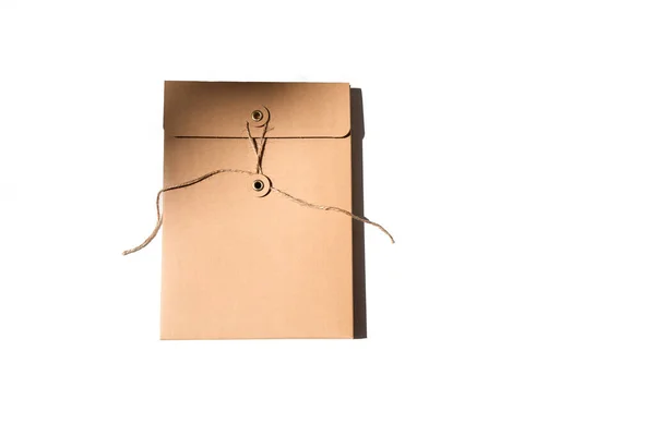 Cardboard Brown Volume Envelope White Background Copy Space Top View — стоковое фото