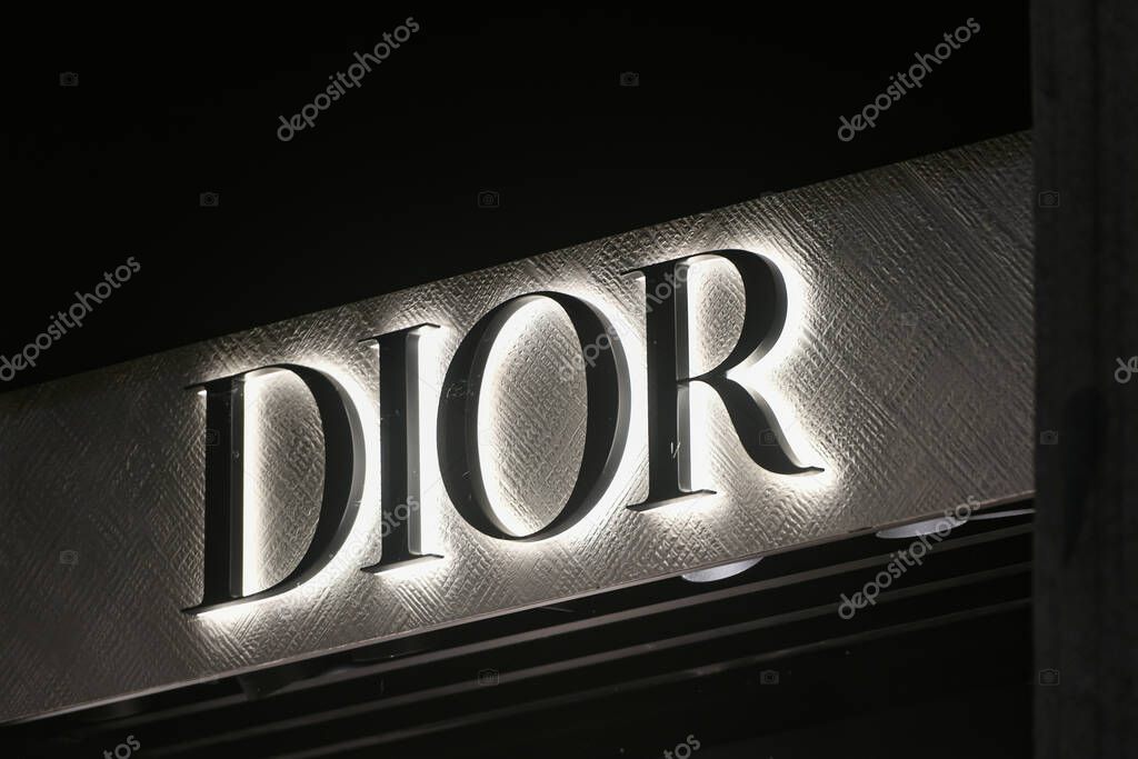 Milan, Italy - September 24, 2021: Dior logo displayed on a facade of a store in Milan.