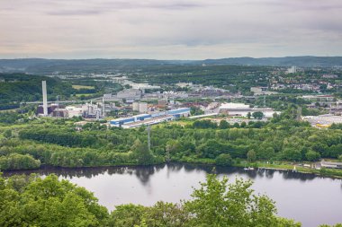 Editorial: HAGEN, NORTH RHINE-WESTPHALIA, GERMANY, MAY 23, 2022 - Helicopter view of industries along the Ruhr in Hagen seen from Hohensyburg