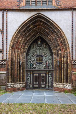 Entrance gate of the Saint Nicolas church with a Quotation of the Book of Genesis: Here is nothing else than the House of God and here is the Gate of Heaven