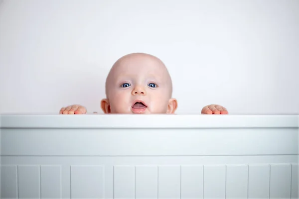 Small Child Peeks Out White Background Child Looks Out Bed — 图库照片