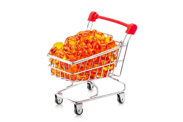 Rode Zachte Gel Vitamine Capsules Mini Supermarkt Push Kar Geïsoleerd — Stockfoto